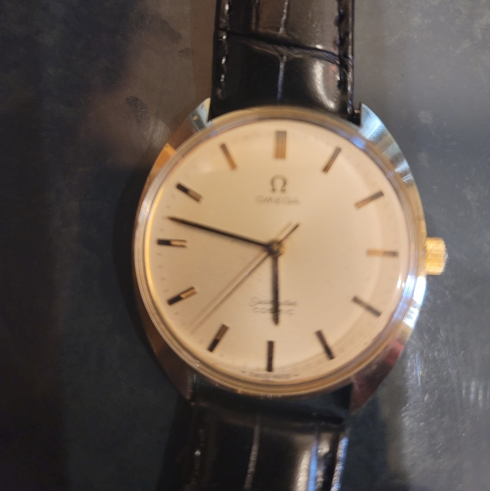 Omega Classic Black and Gold Watch